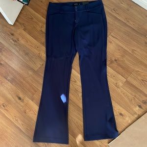 Torrid fitted slacks.  Dark blue.  Zipper with two buttons. New